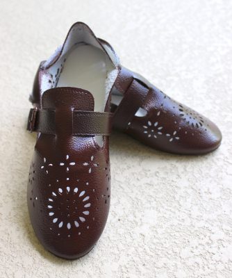Painted shoes in an oxblood color