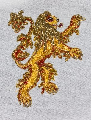 Lannister Embroidery a gold lion worked in yellow thread with gold bullion mane and tail