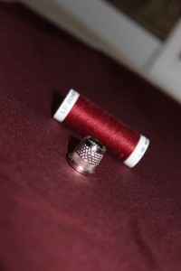 wine red wool and thread