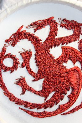 Targaryen Embroidery a red three headed dragon on a white cotton background