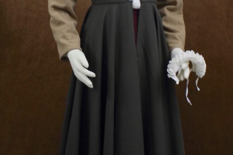 Olive kirtle with caramel wool sleeves and ruff